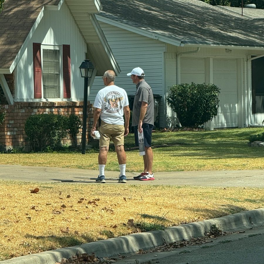 McQueeney talking with a voter